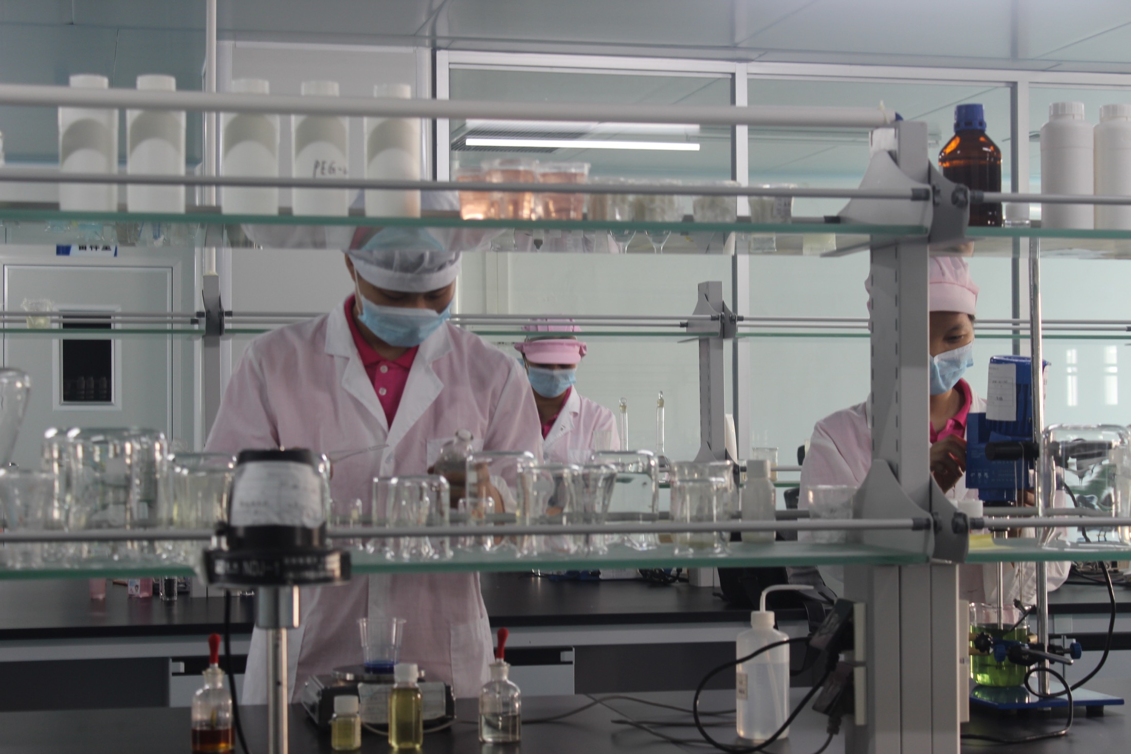 Laboratory team working on cosmetic formulas